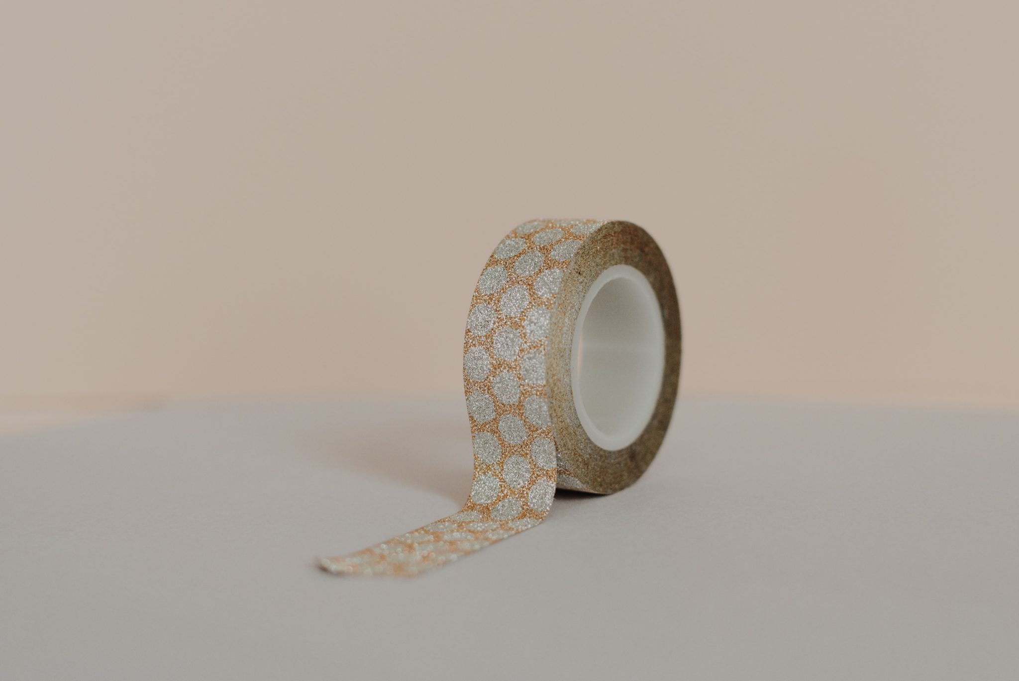 A roll of orange floral tape