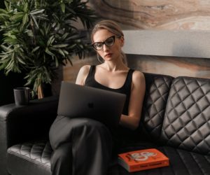 Photo: Young woman working on couch by maxim-ilyahov Unsplash.